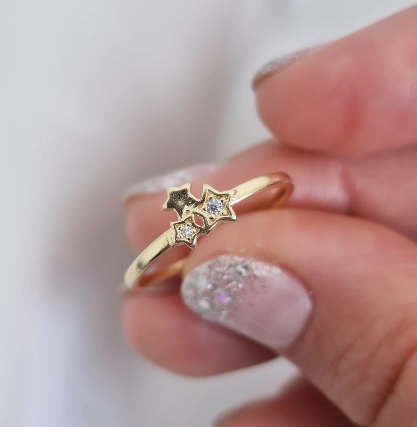 Anillo tres estrellas con circón