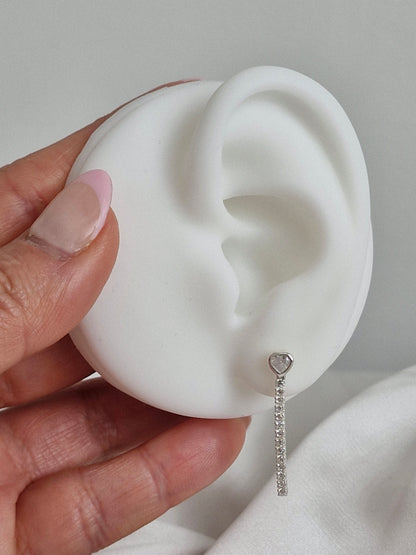 Aros botón corazón con varita de circones