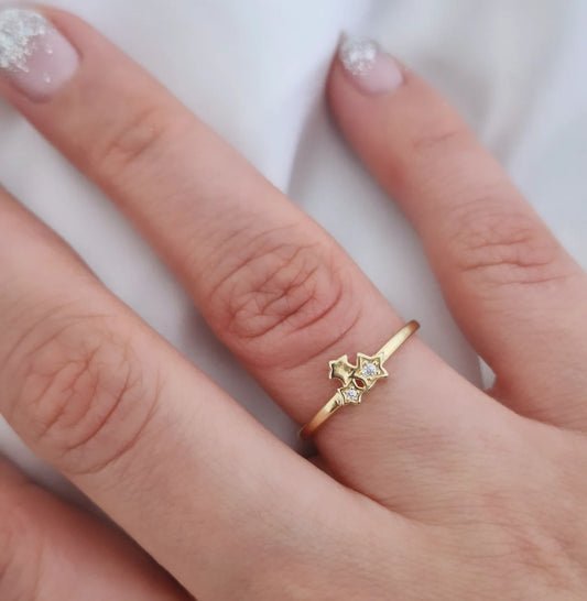 Anillo tres estrellas con circón