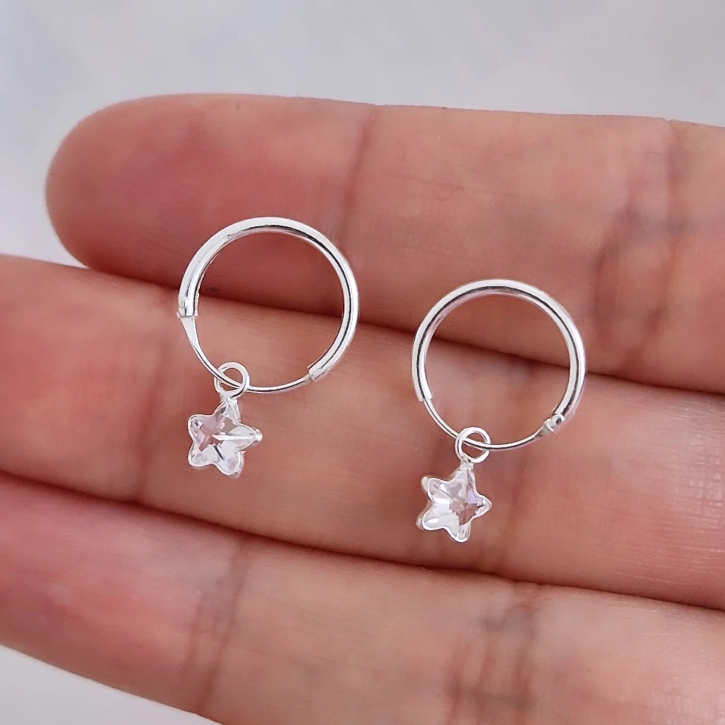 Aros argolla con colgante estrella