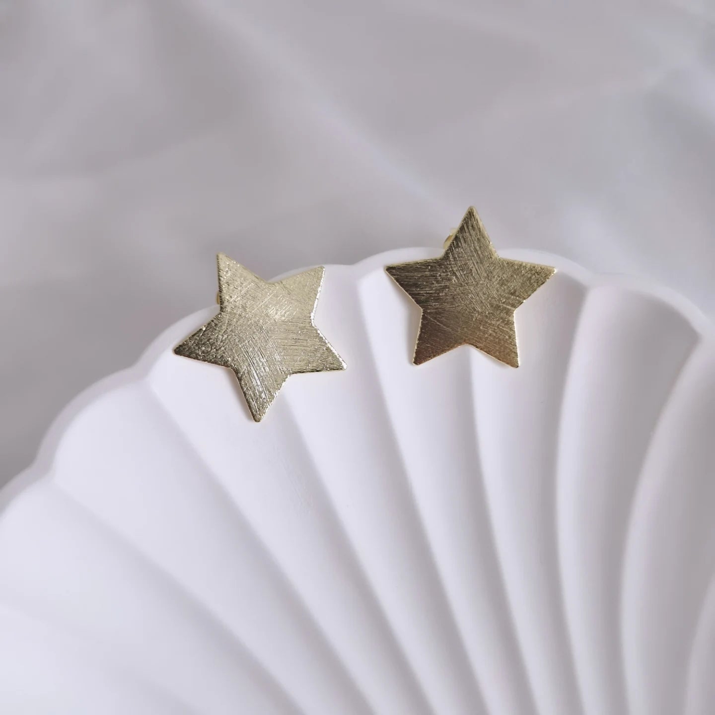 Aros estrella satinada