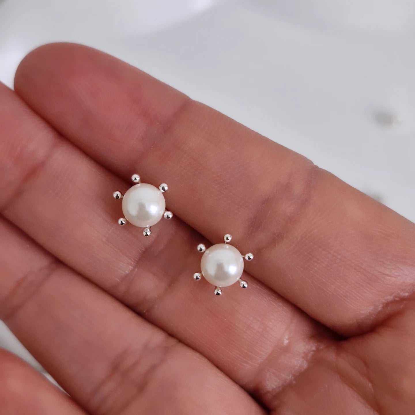Aros perla con pistilo