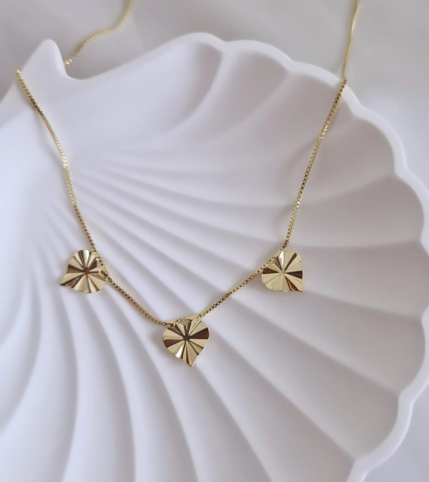 Collar corazones biselados