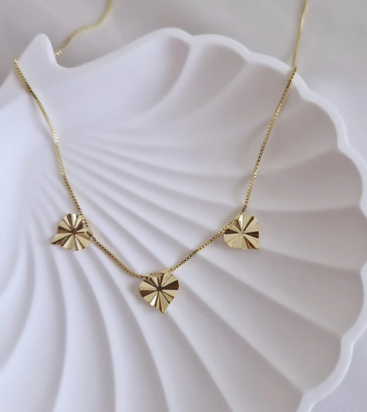 Collar corazones biselados